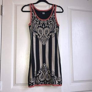 Black and cream knitted striped dress.